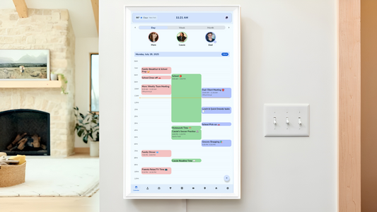 Digital calendar display mounted on a wall in a home setting.